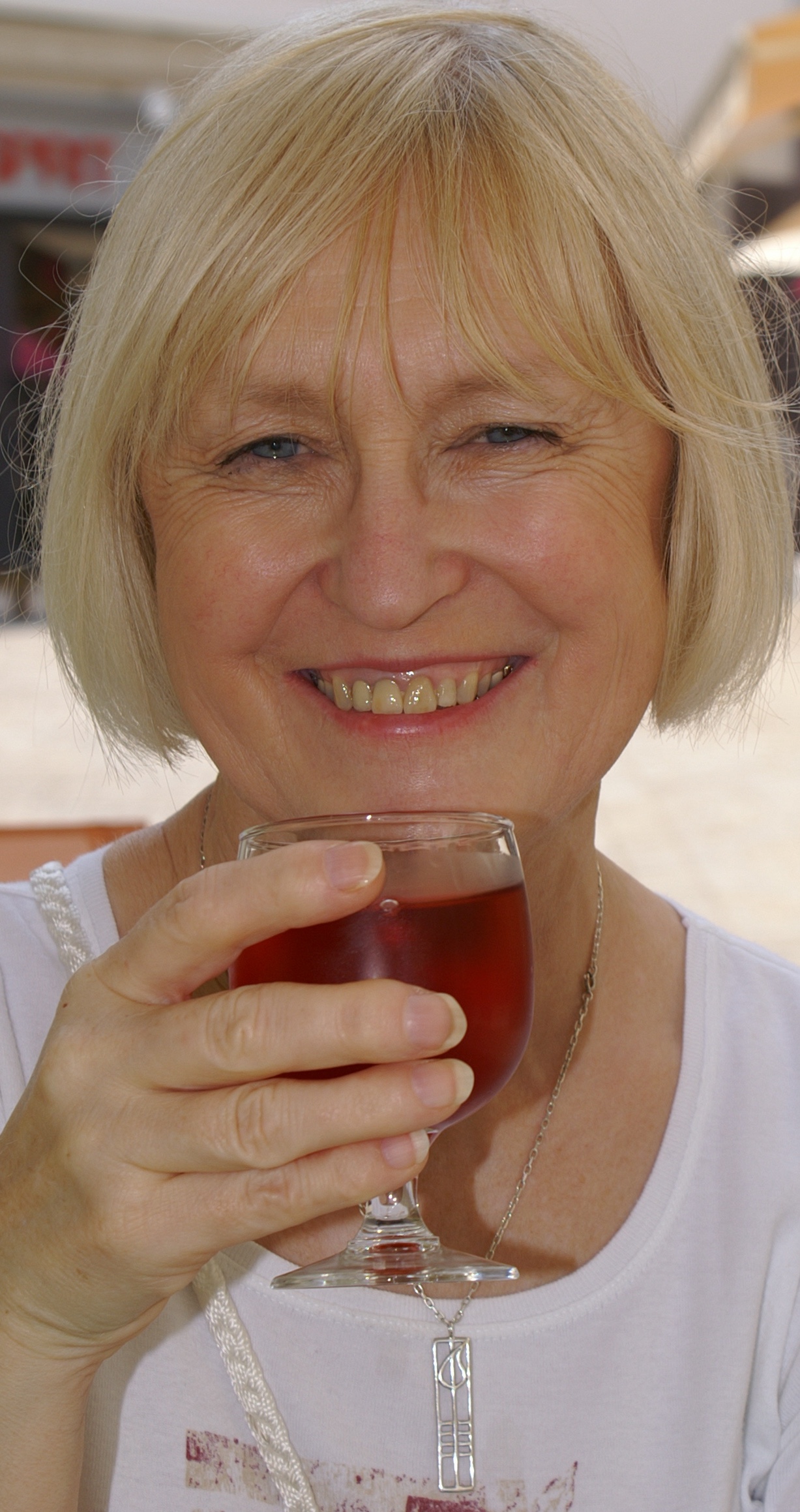 Wendy with glass of red wine