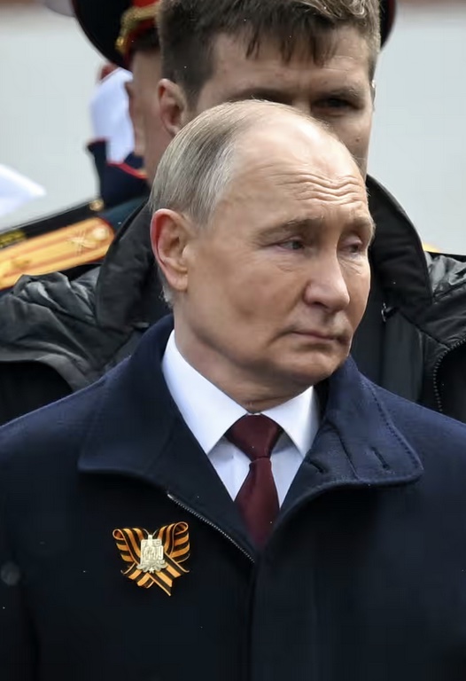 Putin at 'Victory Day' Parade, May 2024. (Guardian 22/10/24, Photograph: Maxim Blinov/AP)