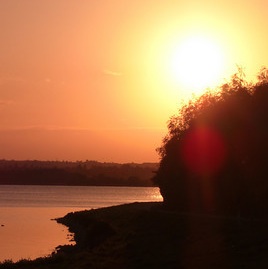 Sunset over Hambelton Old Hall, Rutland Water